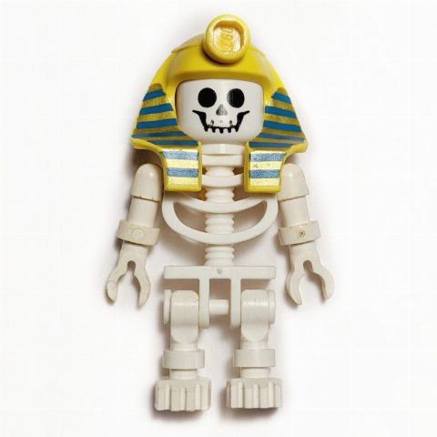 Minifigurka Skeleton, Standard Face, Mummy Headdress, Blue and Gold Stripes