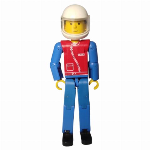 Minifigurka Technic Figure Blue Legs, Red Top with Zip, Blue Arms, Black Hair - White Helmet