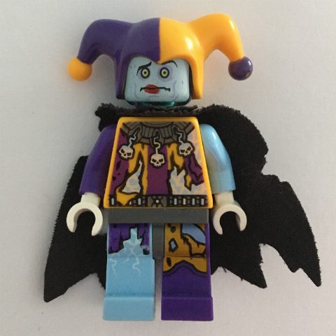 Minifigurka Jestro in Bright Light Orange and Dark Purple Outfit with Tattered Cape