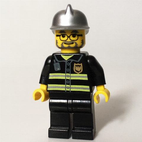 Minifigurka Fireman, Black Fire Jacket with Reflective Stripes, Radio, and Badge, Silver Helmet, Beard and Glasses