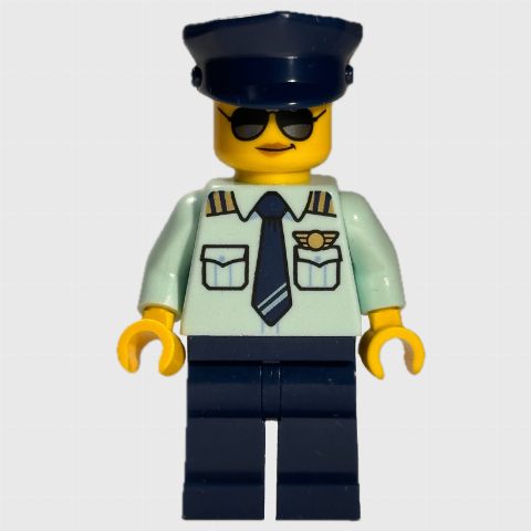Minifigurka Pilot, Bright Light Blue Shirt, Dark Blue Legs, Dark Blue Cap