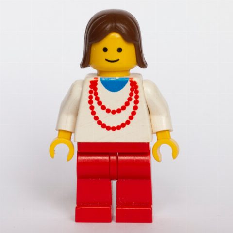 Minifigurka Woman - White Torso, Red Necklace, Red Legs, Brown Hair (3626b Head)