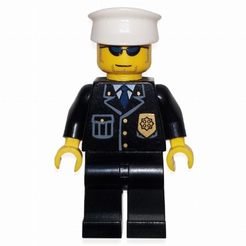 Minifigurka Policeman, Black Suit with Badge, White Hat, Sunglasses, Stubble