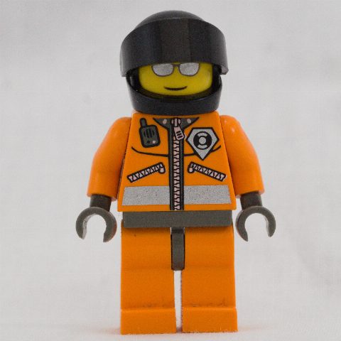 Minifigurka Coast Guard, Orange Jumpsuit with Zipper, Radio, and Badge, Dark Gray Helmet with Visor, Silver Sunglasses