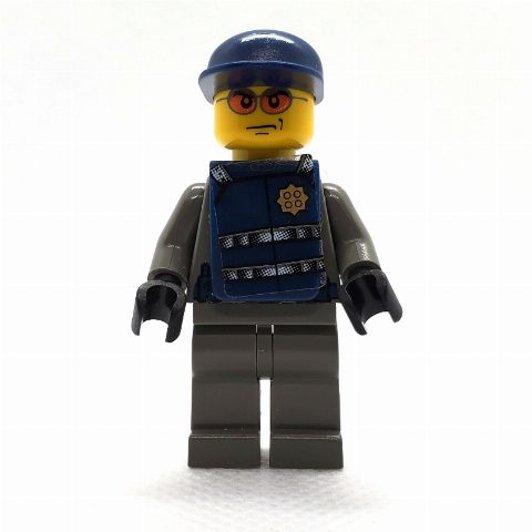 Minifigurka Security Guard, Dark Gray Shirt with Badge, Dark Blue Cap, Dark Blue Vest, Orange Sunglasses