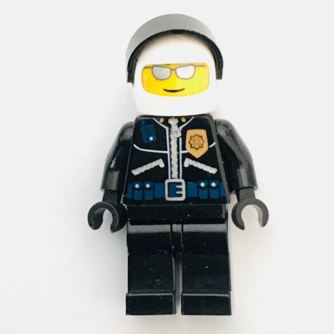 Minifigurka Policeman, Black JAcket with Zipper, Radio, Badge, and 'POLICE' on Back, White Helmet with Visor, Silver Sunglasses